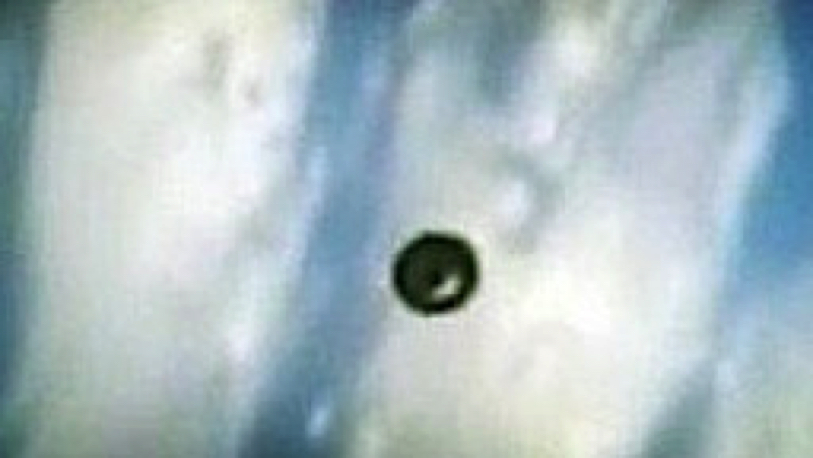 NASA UFO Filmed Above Clouds